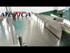Tappatrice ed etichettatrice automatica per il riempimento dello spruzzatore nasale