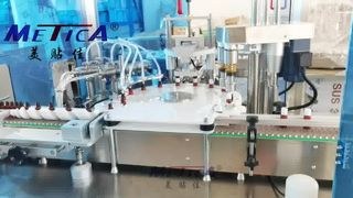 Etichettatrice per tappatura di riempimento di liquidi orali